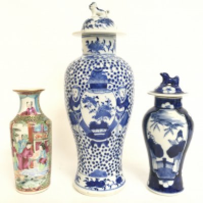 A collection of 19th/early 20th century Chinese export vases including a Cantonese vase and two blue and white examples. 15 to 18cm tall. Some hairline cracks and chips. This lot cannot be posted