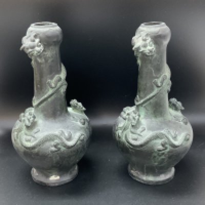 A pair of Oriental bronze vases with dragon overlaid decoration. 17cm.