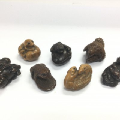 Seven wooden carved netsukes. Shipping category A.