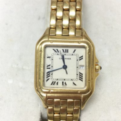 An 18ct gold Cartier Panthere watch. Quartz movement and seen working. Comes with box and additional link. Approximately 116g