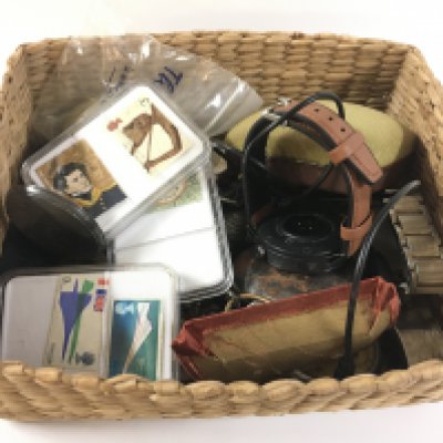 A box of mixed watches including some pocket watches and other oddments.