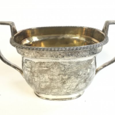 A silver hallmarked sugar bowl. 8cm tall,16.5cm wide approximately. Postage category B
