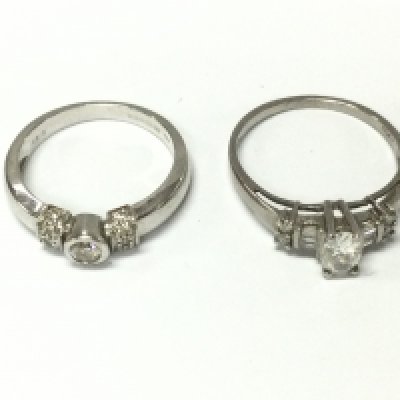 Two 18ct white gold rings set with diamonds. Sizes M and O and 6.10g approx
