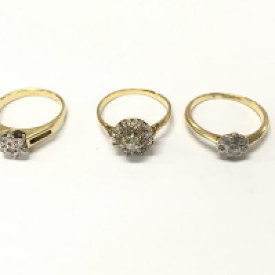 Three 18ct gold diamond cluster rings. Sizes J L and L 1/2 approximately 8.10g