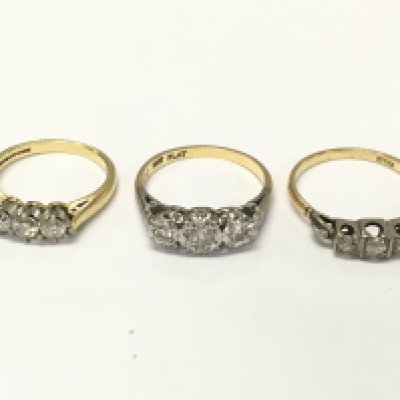 Three 18ct gold diamond three stone rings sizes K N and P approximately 8.4g