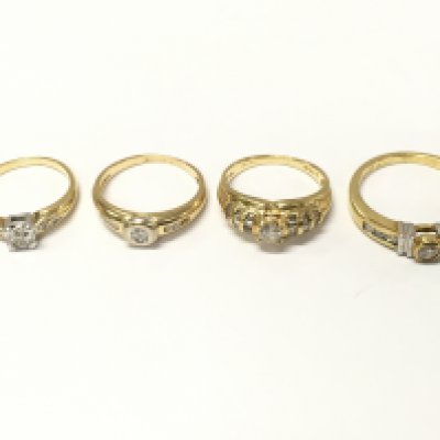 Four 18ct gold diamond solitaire rings with diamond shoulders. Sizes I 1/2 L O approximately 12.5g