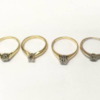 Four 18ct gold diamond solitaire rings sizes I 1/2 K and L approximately 8.7g