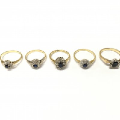 Five 18ct gold diamond and sapphire cluster rings. Size J K and N approximately 16g