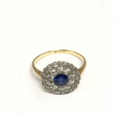 A 1930s 18ct gold, diamond and sapphire cluster ring, approx 2.7g and approx size M. Shipping category A.
