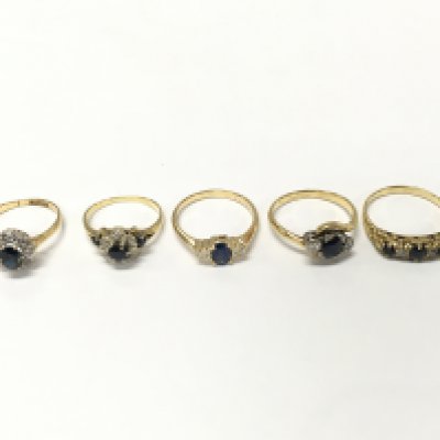 Five unmarked yellow metal diamond and sapphire rings. Sizes K K1/2 M N P approximately 14.7g