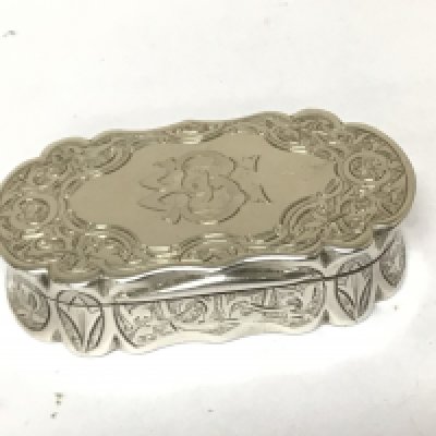 A Victorian silver Snuff box with Bright cut decoration Birmingham hallmarks.
