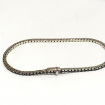 An 18ct white gold line bracelet set with sapphires, approx 7.4g. Shipping category A.