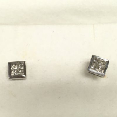 A pair of 9ct white gold illusion Princess cut studs.
