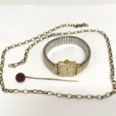 A ladies Tissot watch, gold belcher link chain and stick pin. Shipping category A.
