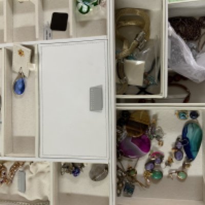 A large jewellery box and jewellery contents.