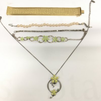 Four bracelets and a floral design necklace. Postage B. NO RESERVE
