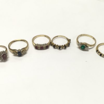 Six 9 carat gold rings set with various gemstones , 11g total weight, various sizes J to O. postage category A