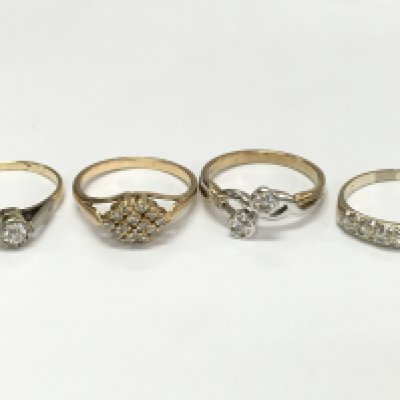 Unmarked Rings set with diamond and Moissanite stones . Three high carat (7g total weight) one non gold. Postage category A