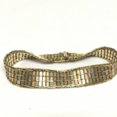 A three tone 9ct gold bracelet, approx 22.6g. Shipping category A.