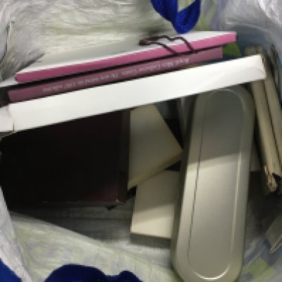 A bag of mixed coinages including loose coins and coin sets.