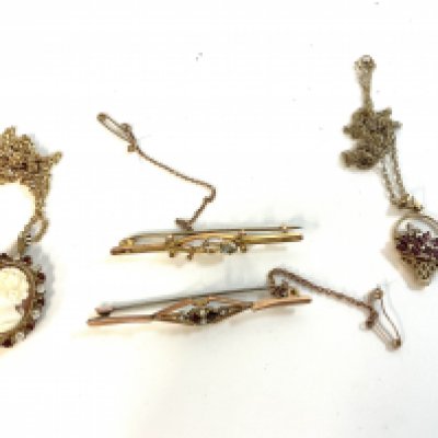 2 vintage pendant and chains together with 2 vintage gold bar brooches.