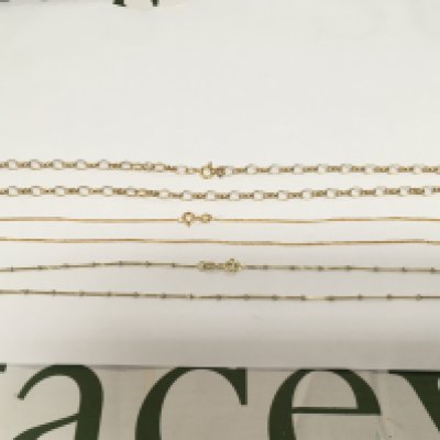 Three 9ct gold necklaces, approx total weight 9g. Shipping category A.