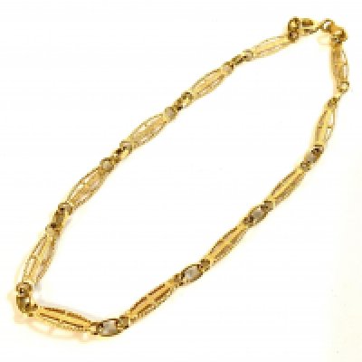 An 18ct yellow gold filigree design bracelet. (A)