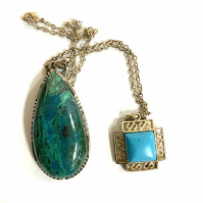 2 sterling silver and turquoise pendants and chains.