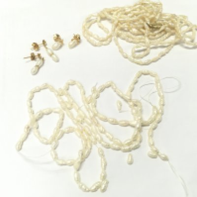 Withdrawn -A small collection of pearl jewellery . Necklace with a 14k clasp. Postage cat A