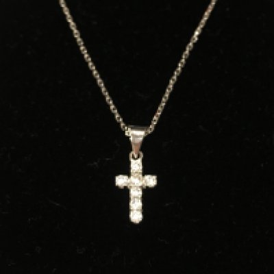 An 18ct white gold diamond cross pendant and chain. 3.62g