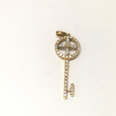 An 18ct diamond key pendant. 2.10g approximately