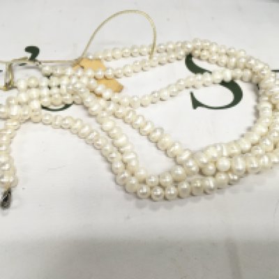Three 18&#2013266057۝ cultured Pearl necklaces.