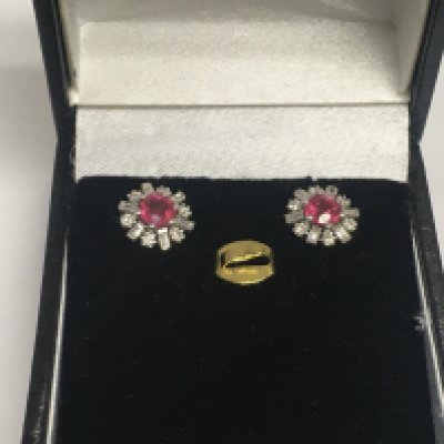 A pair of 14ct white gold, ruby and diamond ear studs, approx 1.8g. Shipping category A.