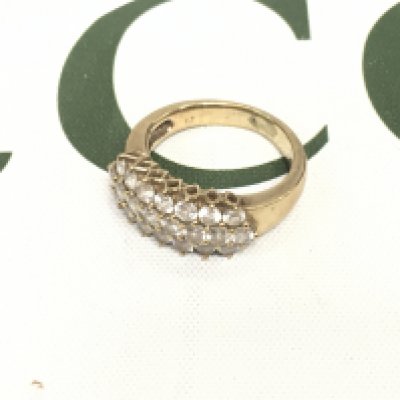 A 9ct gold ring set with czs. Approx weight 5.41grams, size N.