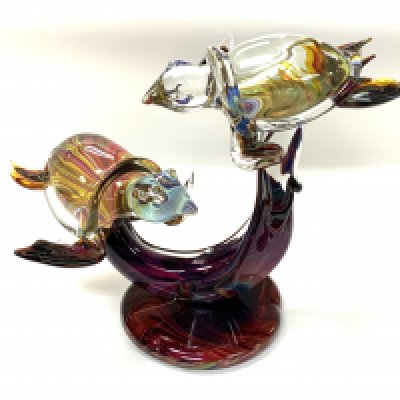 A Chalcedony glass sculpture in the form of 2 diving turtles from the Tagliapietra Murano glass foundry, &plusmn;venice. C.1980/90s. No damage or restoration. Signed to the base section. (Postage Catagory D, we are unable to offer in house postage on this lot).