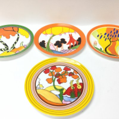 Four limited edition Wedgwood Clarice Cliff pattern plates. Plates including Bridgewater, Summerhouse, Windbells, Honolulu. This lot cannot be posted