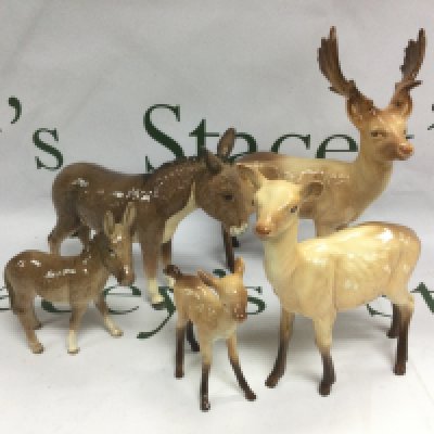 Three Beswick deer, donkey and foal (5). Shipping category D.