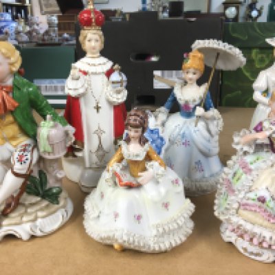 A collection of German style porcelain figures. This lot cannot be posted