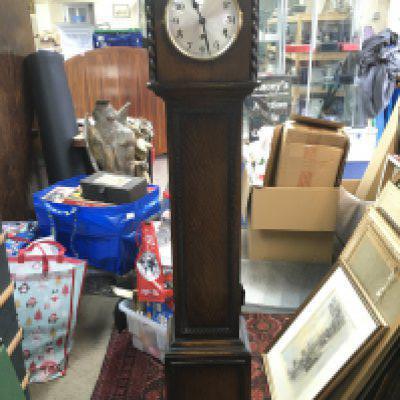 An oak Granddaughter clock ,148cm tall , 31cm wide