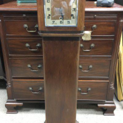 A 1940s Oak Veneered granddaughter clock with german movement. 100cm tall approximately