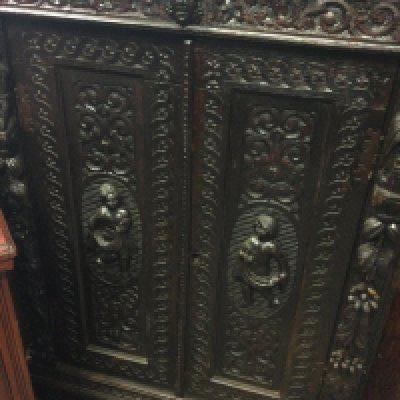 A collection of furniture including a carved corner cabinet a small cabinet with single drawer carved door on a plinth base and a Edwardian pot cupboard.