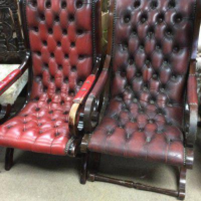 Two open arm chains with button back and seats together with a low stool On cabriole legs