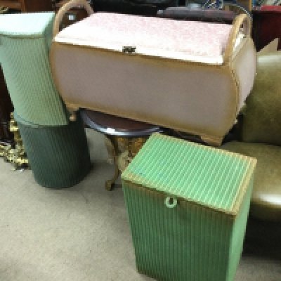 A collection of assorted Lloyd loom baskets.