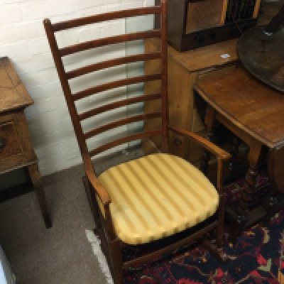 A beechwood leader back rocking chair