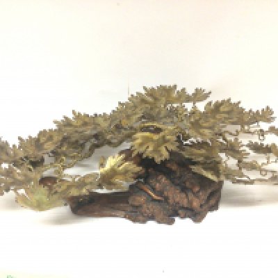 A 20th century sculpture root wood with applied gilt metal foliage with applied plaque Gerard 1979. length 80cm