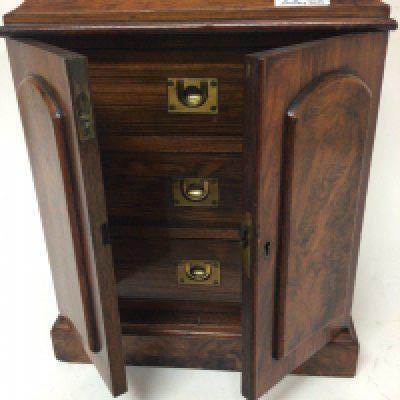 A quality late 19th century walnut collectors cabinet fitted with three drawers with brass inset handles. Height 36cm