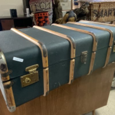 An Antique pink trunk. 103cm x 50 x 54cm together with a wood and canvas bound shipping trunk.