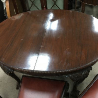 A set of 6 mahogany dining chairs two carvers and table. 140 x 110 cm