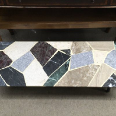 A marble top mid 20th century design coffee table. 105cm by 38cm
