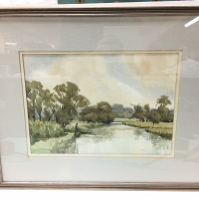 A framed watercolour by Katherine William-Powlett (1911-1996) titled River Test depicting a fly fisherman at a river. Dimensions 53x44cm